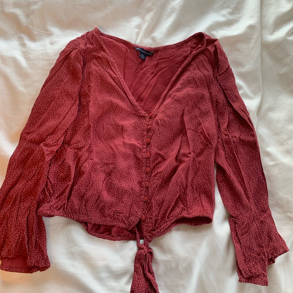 Red polka dot tie front blouse